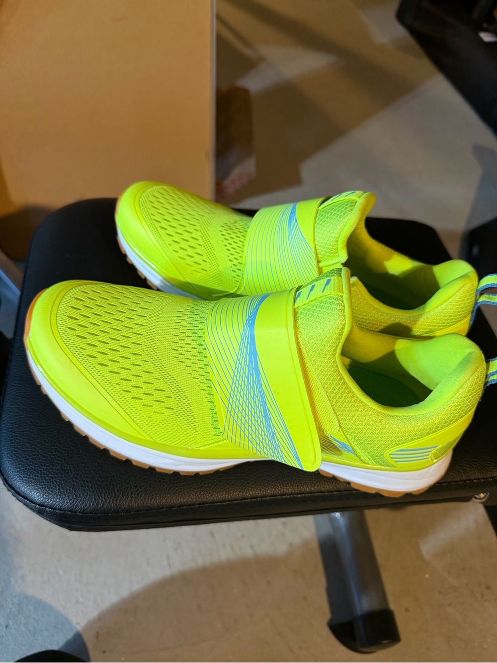 Neon green spin shoes with clips